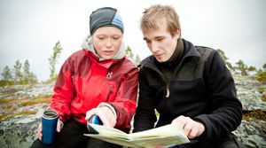 Reading a Map in the Arctic  PHOTO: Tommy Hansen