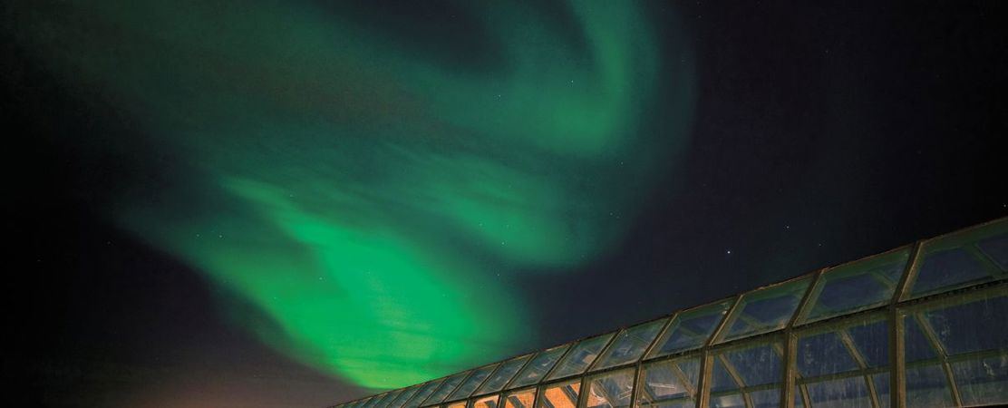 Arktikum under northern lights, Rovaniemi