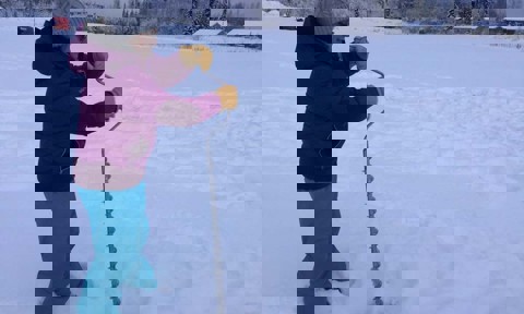 Dawn Pomrening, Sidney Huntington School, Galena, Alaska, measures ice thickness with the Fresh Eyes on Ice project. This is an example of engaging local observers in collecting data that are of value to a broad array of scientific and forecasting applications while also integrating STEM education into the research process.