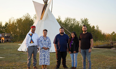 Researchers from Onion Lake Cree Nation, Ralph Morin and Dolores Pahtayken (left), stand with researchers from Pewaseskwan (the Indigenous Wellness Research Group), Jarrett Crowe (centre), Anne Mease (second from the right), and Luke Heidebrecht (right)