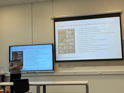 Liz giving the talk to the ICred research group.