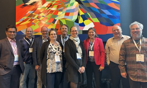 From left, Kamrul Hossain, David Natcher, Gunnar Stefánsson, Tuija Turunen, Jan Borm, Melody Brown Burkins, Hanne Hvidtfeldt Christiansen, David Anderson, and Philip Steinberg. 