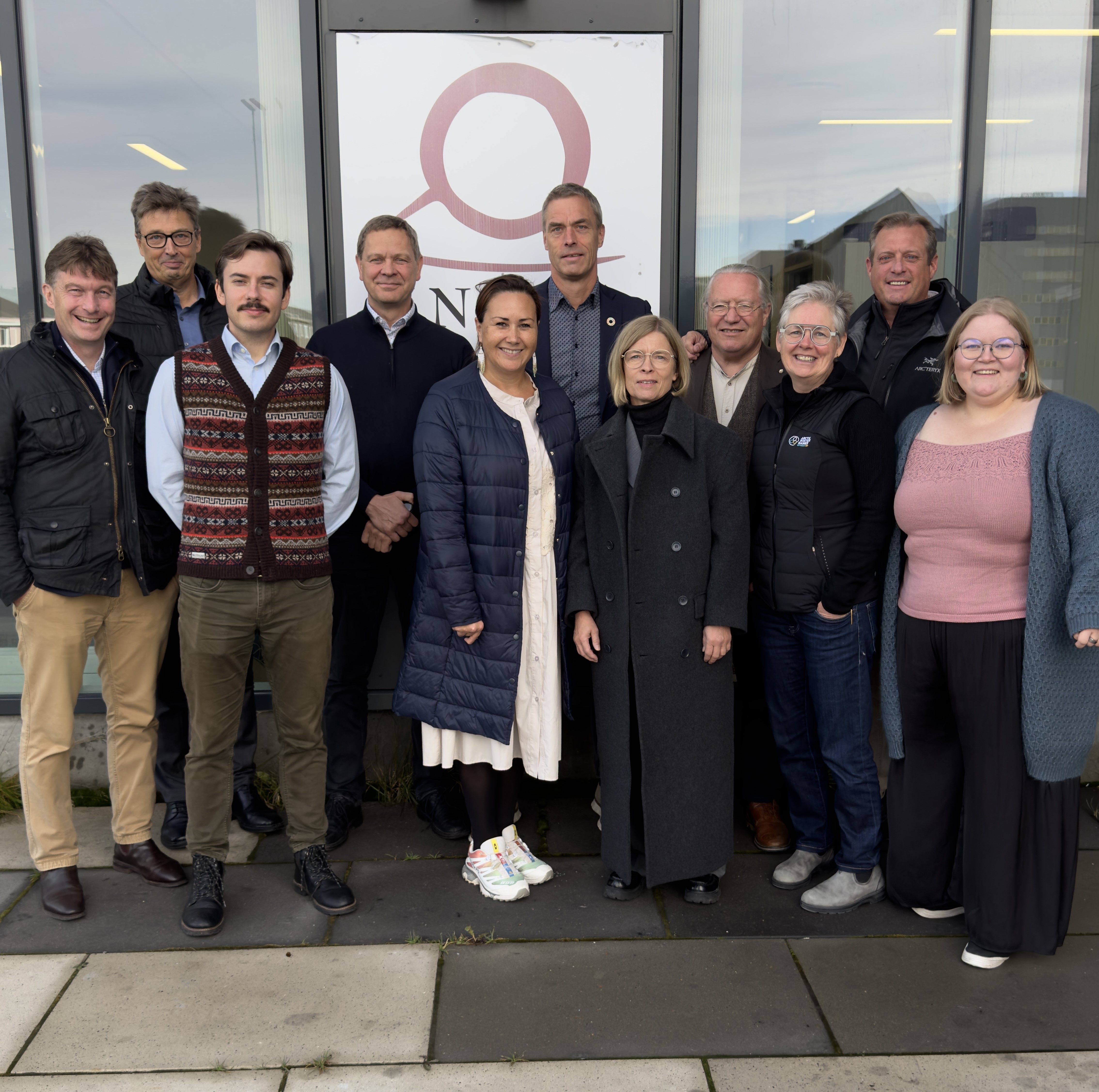 UArctic Board members in front of Inuit Circumpolar Council office in Nuuk.