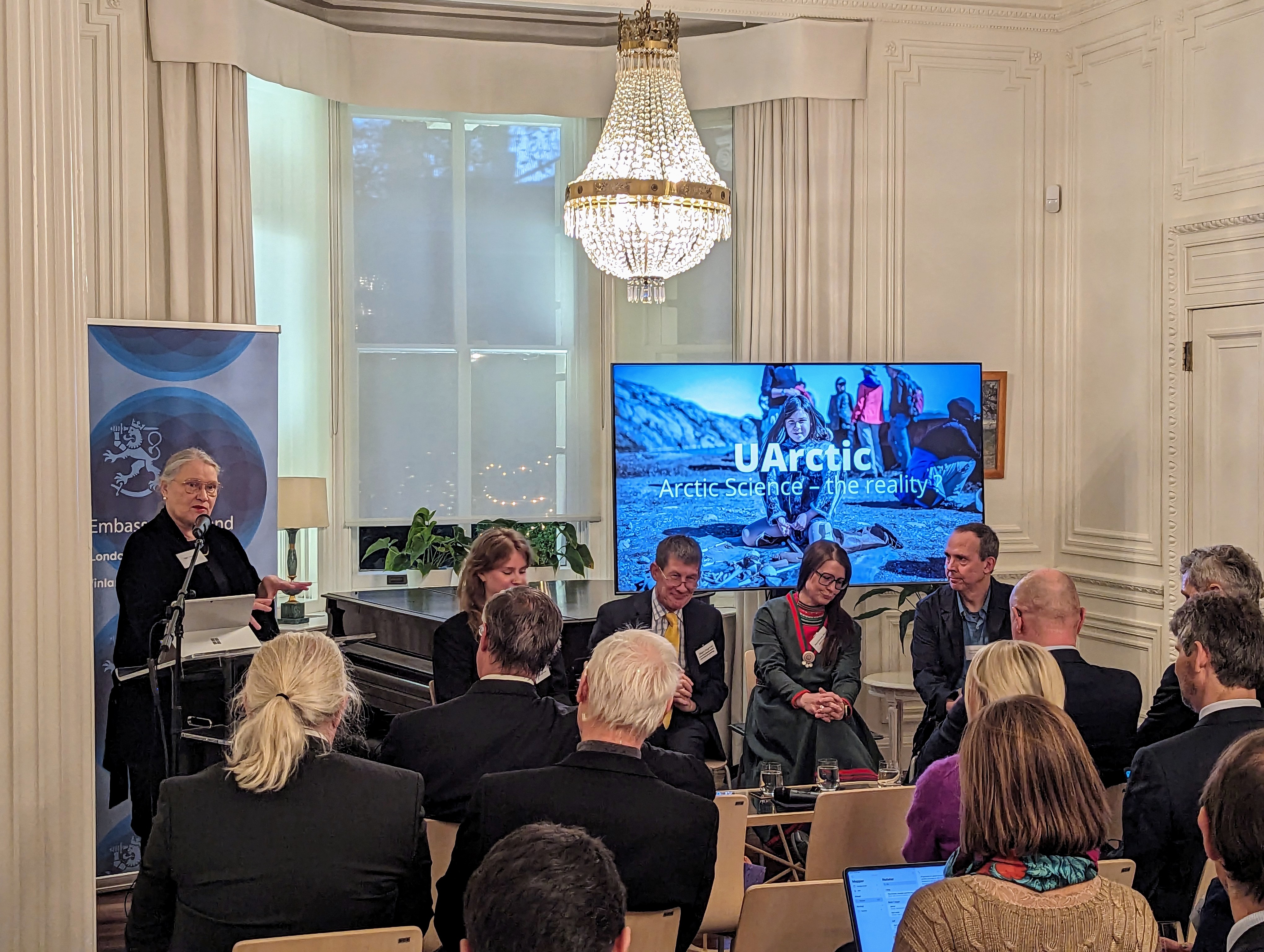 Panel discussion at the event at the Finnish Ambassador&#x27;s Residence in London, November 21, 2023. Moderator on the podium: Outi Snellman. Panelists from left to right: Anni Pokela, Shaun Fitzgerald, &#xC5;sa Larsson Blind, Keith Larson. 